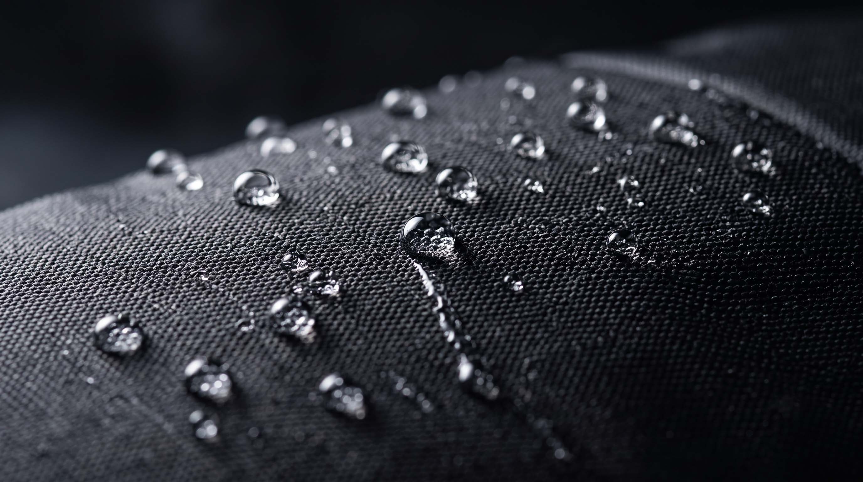 Water rolling off the nylon shell close up